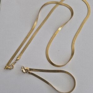 Sleek Gold Necklace by [Brand]